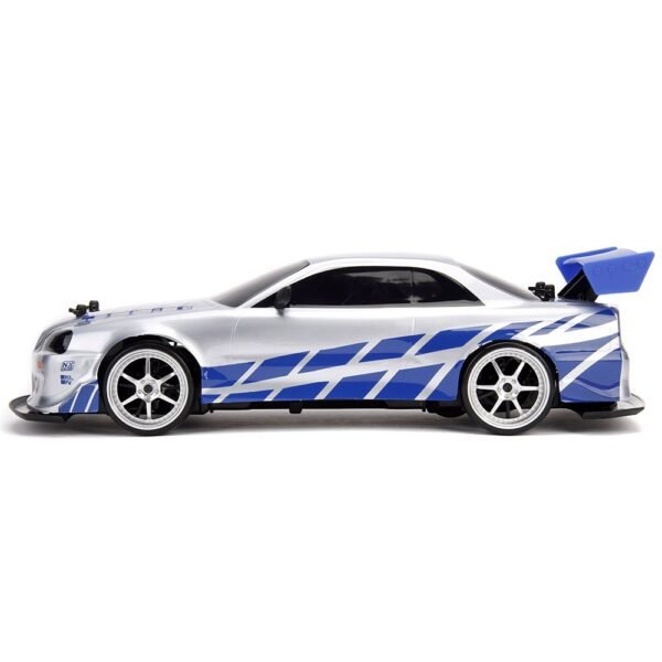 Masina Jada Toys Fast And Furious Nissan Skyline Gtr Drift Cu Anvelope Si Telecomanda - Imagine 4