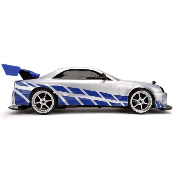 Masina Jada Toys Fast And Furious Nissan Skyline Gtr Drift Cu Anvelope Si Telecomanda - Imagine 6